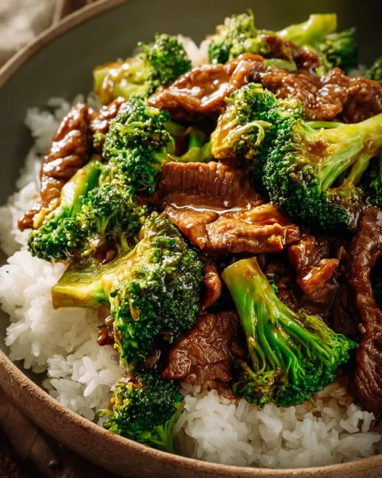 Plate of Chinese beef and broccoli stir-fry with tender beef and fresh broccoli
