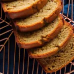 Healthy banana bread no sugar whole wheat baked loaf with banana slices on top