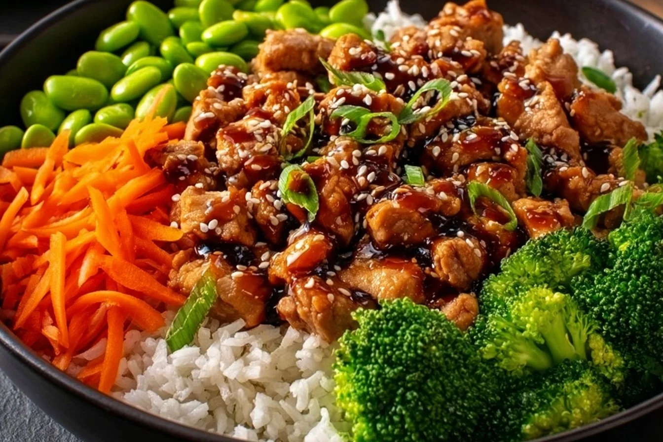 Delicious Teriyaki Turkey rice bowl topped with fresh vegetables.